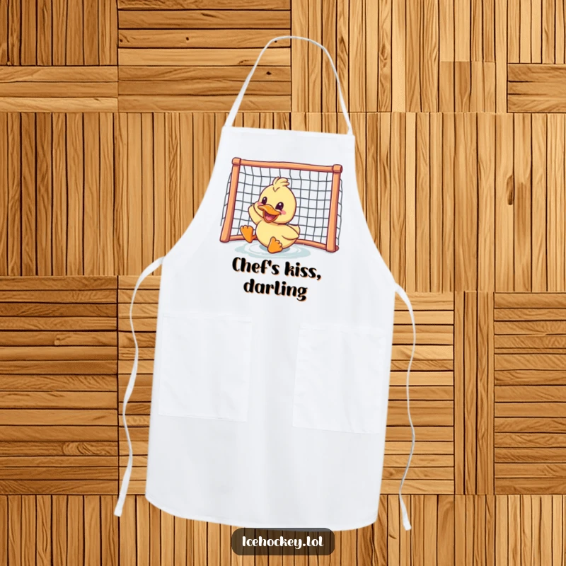 Funny duck apron: a grinning duck sliding towards a hockey net, ready for kitchen action with a playful, athletic flair.
