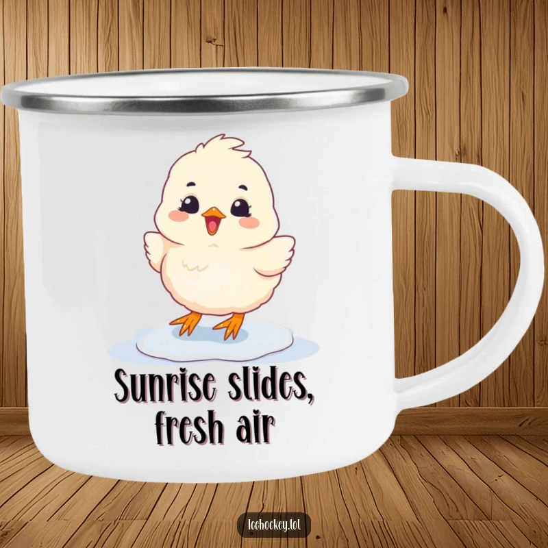 Funny Camping Mug with a fluffy chick sliding on ice with glee, ideal for enjoying beverages during outdoor activities.