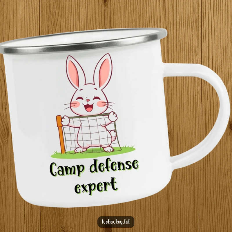 Funny cheerful rabbit defending a miniature net with joy on a camping mug.