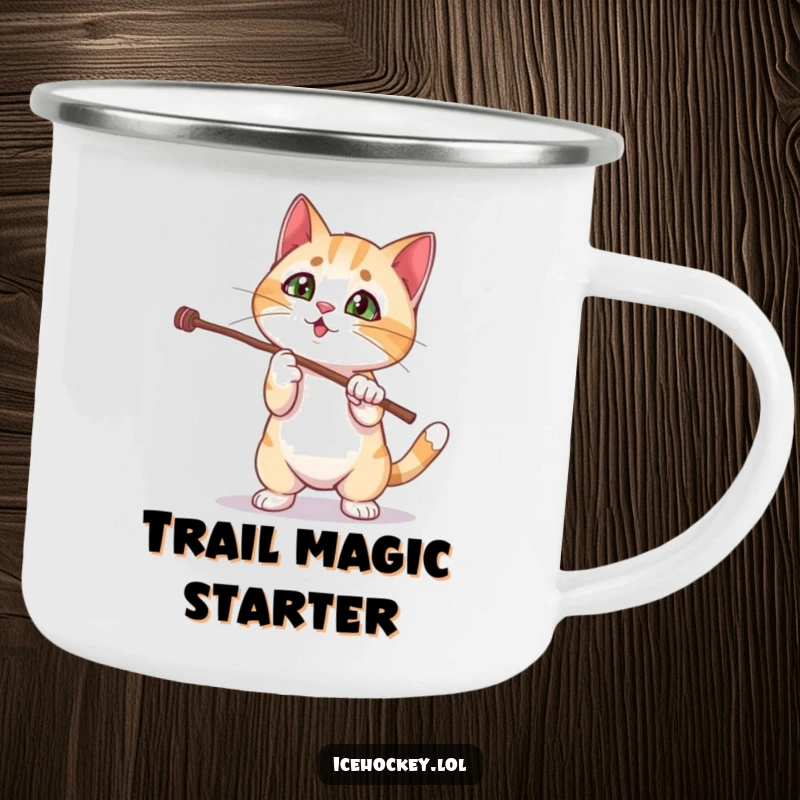 Funny cat camping mug with a curious kitten hilariously failing a magic stick trick, perfect for outdoor coffee breaks.