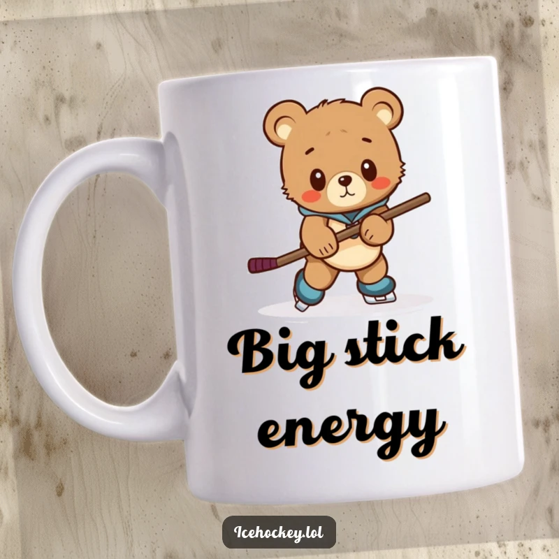 Funny bear cub hockey mug depicting a curious cub awkwardly trying to skate with a comically oversized hockey stick.