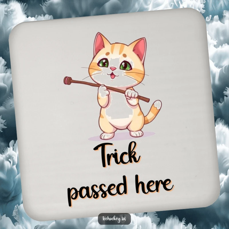 Funny cat coaster showing a curious kitten comically failing a magic stick trick, a humorous addition to any tabletop.
