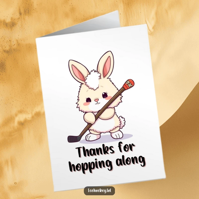 Funny Free Printable Thank You Card: A fluffy bunny holds a hockey stick, looking ready to deliver a thank you with enthusiasm.