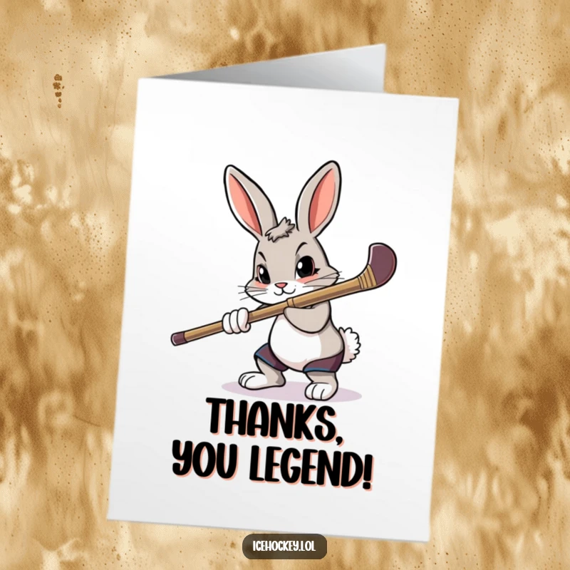 Funny free printable thank you card: A determined rabbit aims a hockey stick with focus, offering a precise thank you.