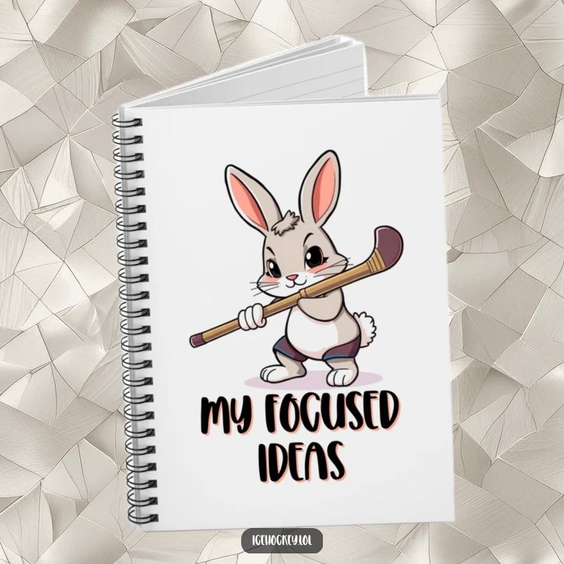 Funny notebook featuring a determined rabbit aiming a hockey stick with intense focus, ready for notes.
