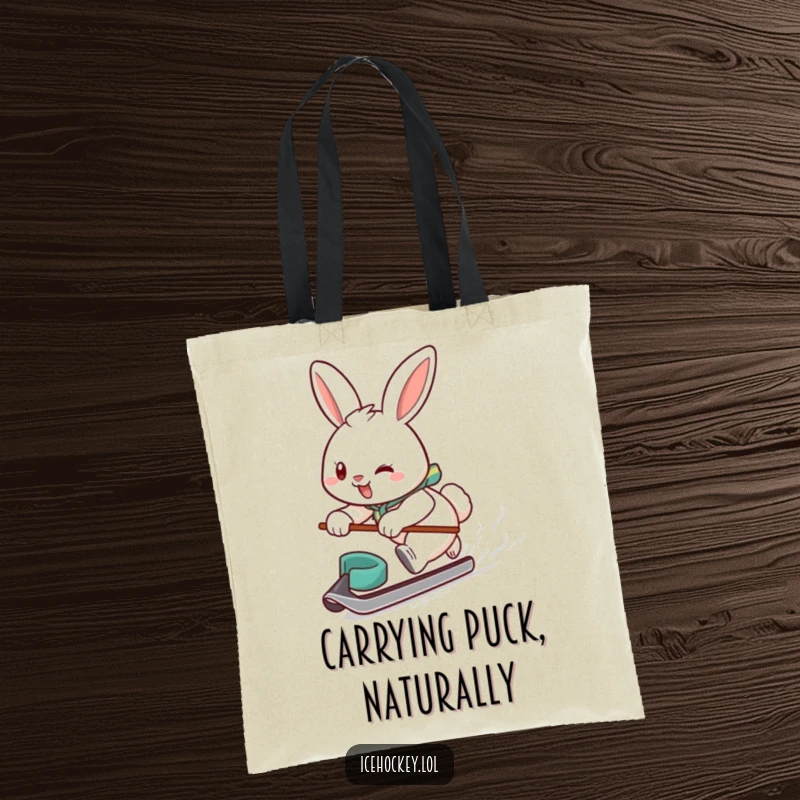 Funny tote bag with a determined, smiling bunny skillfully gliding on ice, puck at its feet, ready for a hockey game.