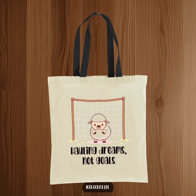 Funny sheep, dressed as a soccer goalie, stands guard over an empty net on a tote bag.